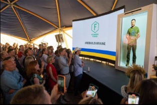 Volodymyr Zelensky appearing as a hologram in London