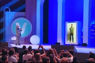 Volodymyr Zelensky appearing as a hologram in Paris