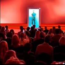 Volodymyr Zelensky appearing as a hologram in Stockholm